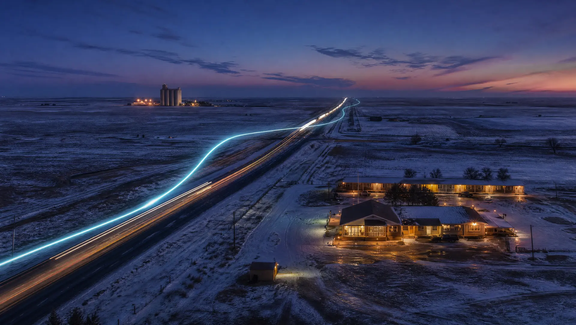 Illustration of snow-dusted ranchland, an interstate with truck lights and a roadside diner at dusk, representing Amarillo and the Panhandle